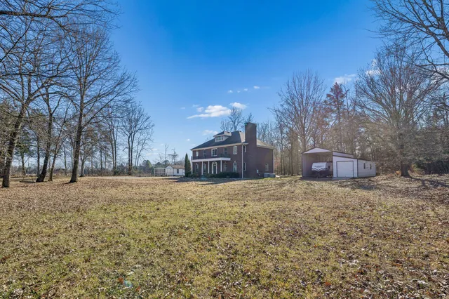a house view with a outdoor space