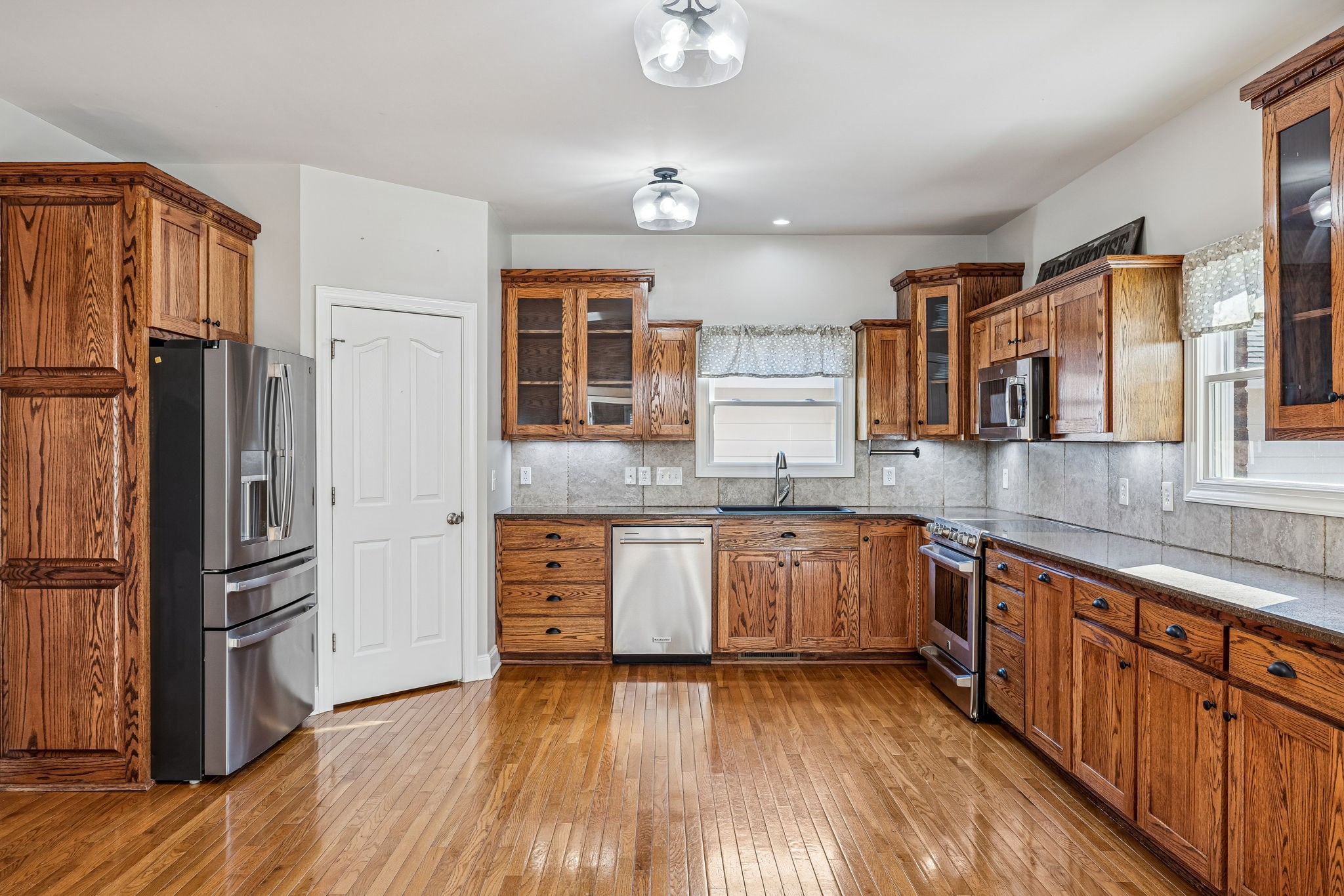 3840 East Compton Road Murfreesboro, TN 37130 - Photo 10 of 51 a kitchen with stainless steel appliances granite countertop a refrigerator and a sink