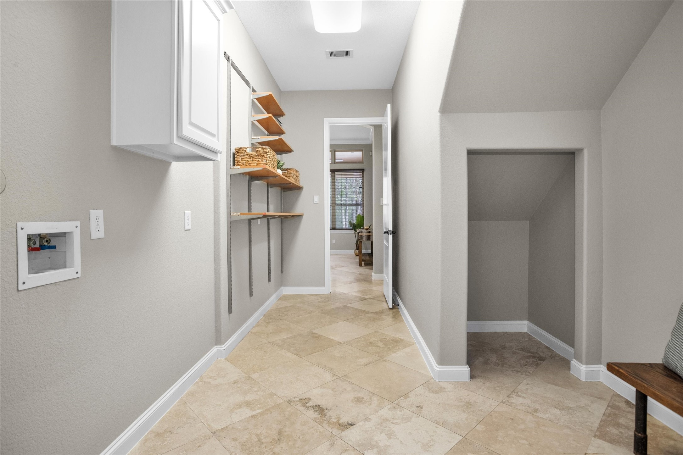 27910 Hansons Court Spring, TX 77386 - Photo 29 of 50 View of under-the-stairs storage area in the laundry/mudroom from garage entry door