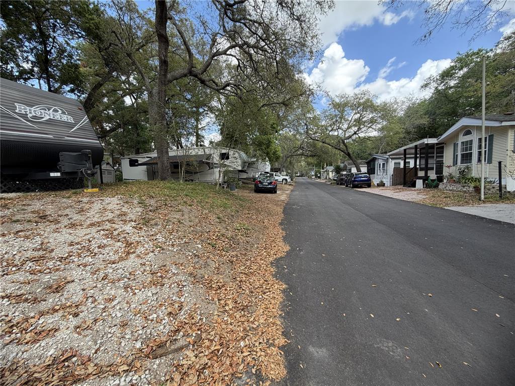 3000 Clarcona Road, Unit 743 Apopka, FL 32703 - Photo 54 of 54 a view of a street with a building in the background