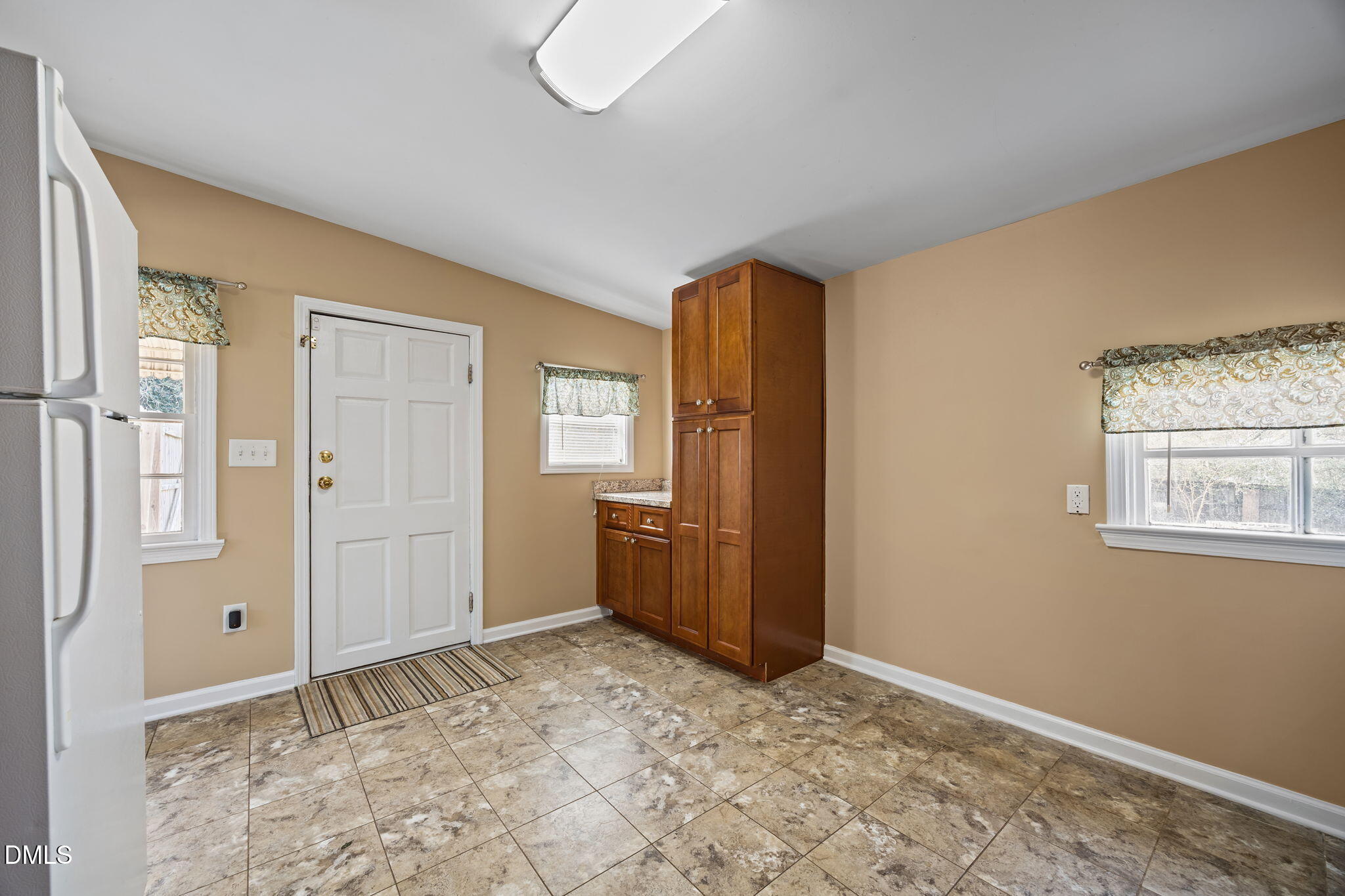 209 Weston Road Garner, NC 27529 - Photo 7 of 37 a view of an empty room and window