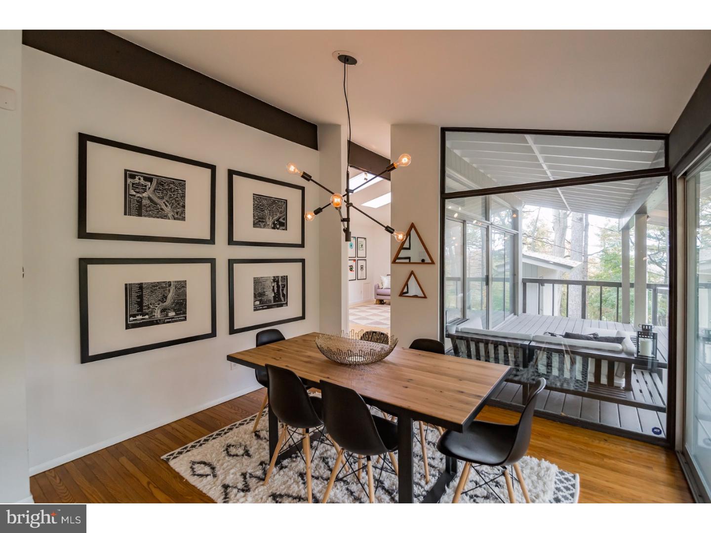 356 Pugh Road Wayne, PA 19087 - Photo 12 of 25 a view of a dining room with furniture window and wooden floor