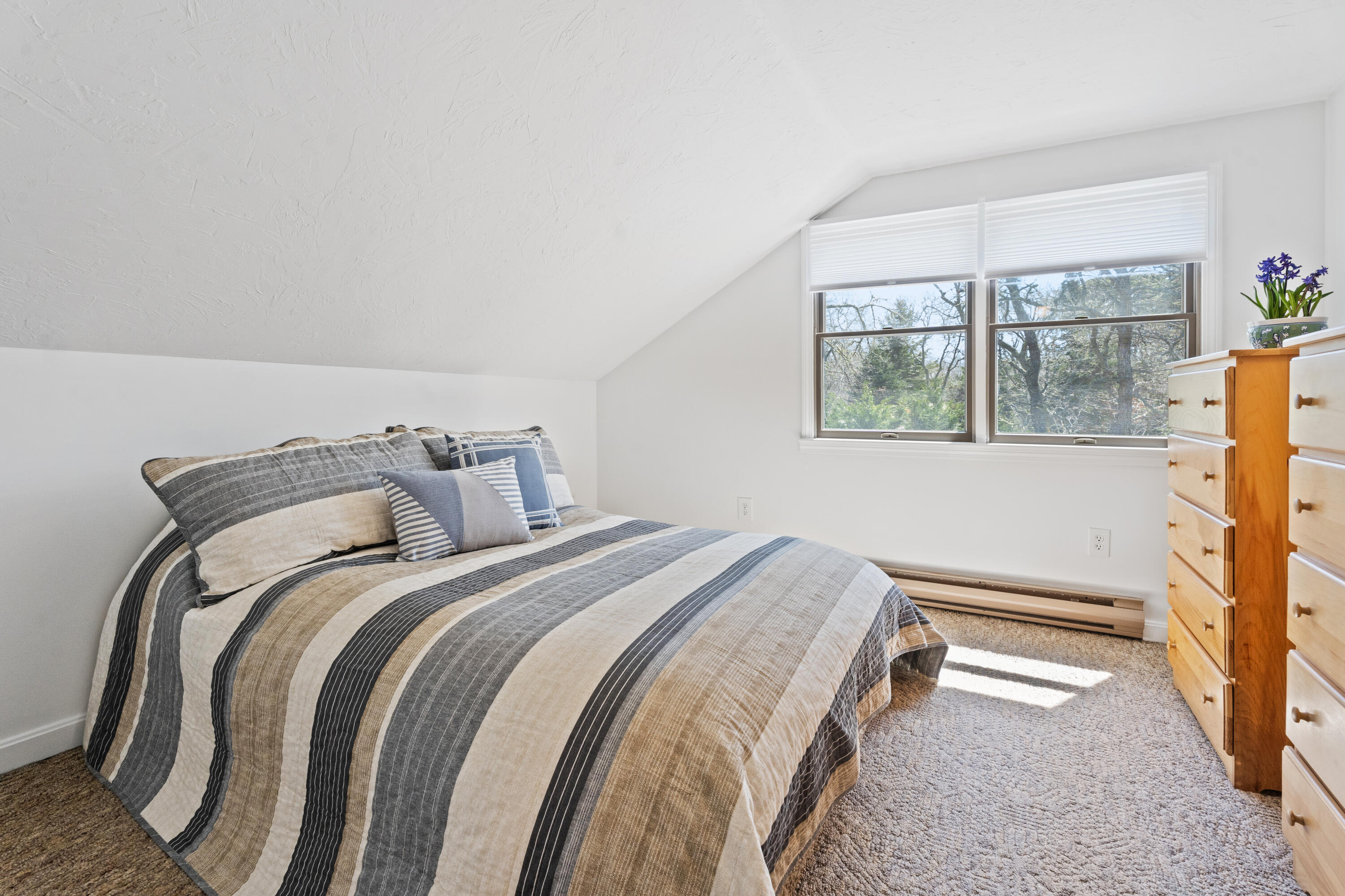 9 Sampson Avenue Edgartown, MA 02539 - Photo 16 of 35 a bedroom with a bed and a window