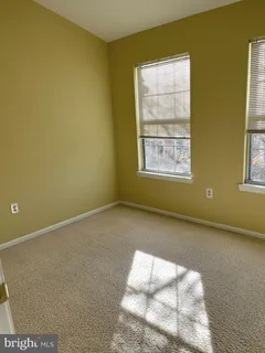 a view of a room that has a window in it