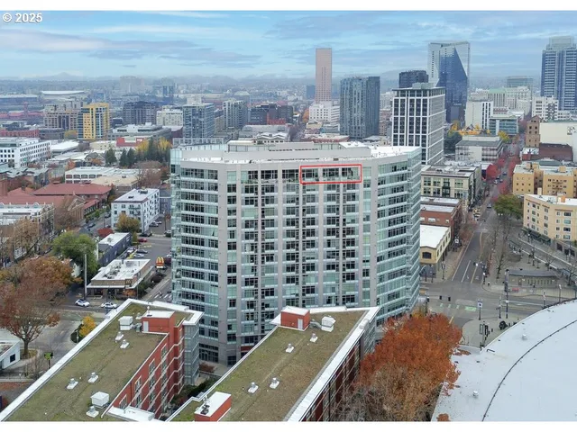 a view of city with tall buildings