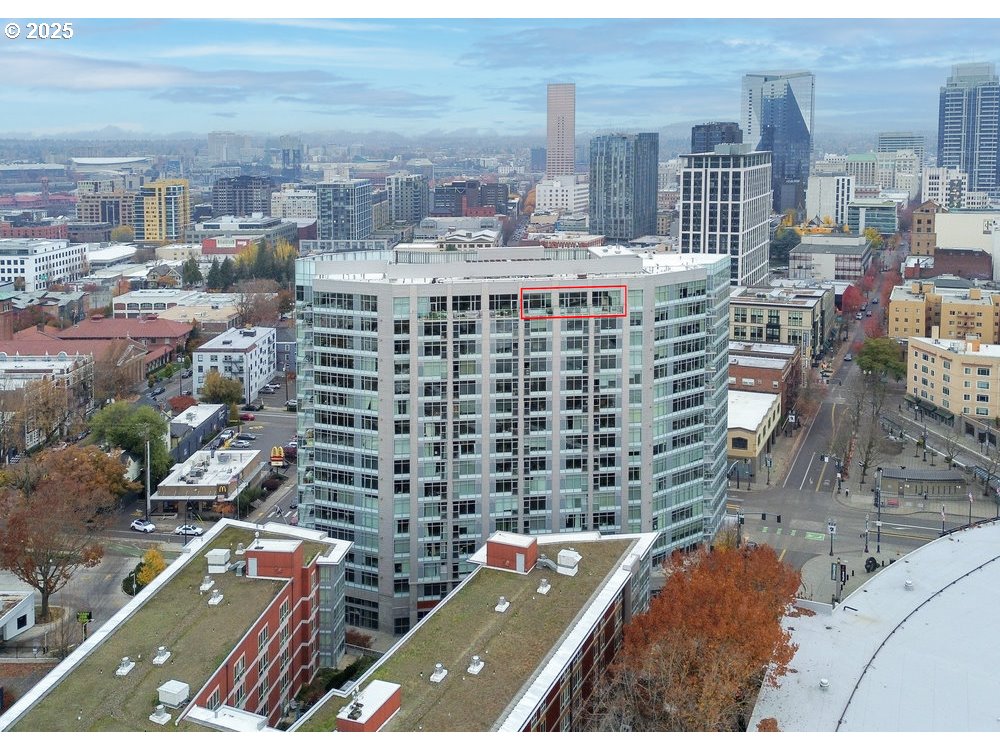 a view of city with tall buildings