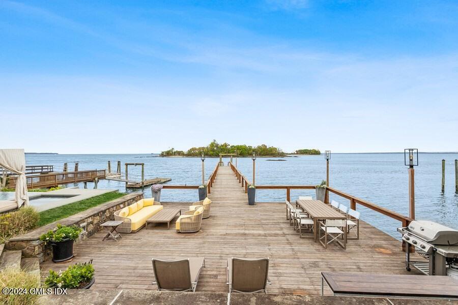 61 Byram Shore Road Greenwich, CT 06830 - Photo 4 of 36 an outdoor space with furniture