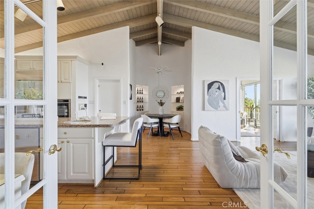 1308 Vía Coronel Palos Verdes Estates, CA 90274 - Photo 20 of 74 a living room with furniture and wooden floor