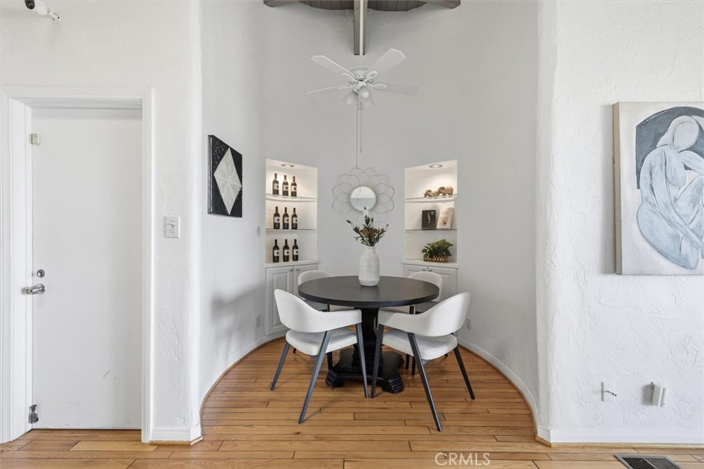 1308 Vía Coronel Palos Verdes Estates, CA 90274 - Photo 26 of 74 a view of a a dining room with furniture a chandelier and wooden floor