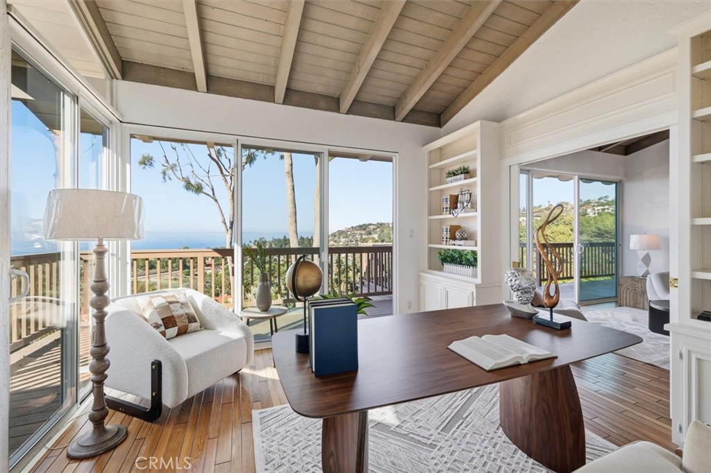 1308 Vía Coronel Palos Verdes Estates, CA 90274 - Photo 35 of 74 a living room with furniture a large window and wooden floor