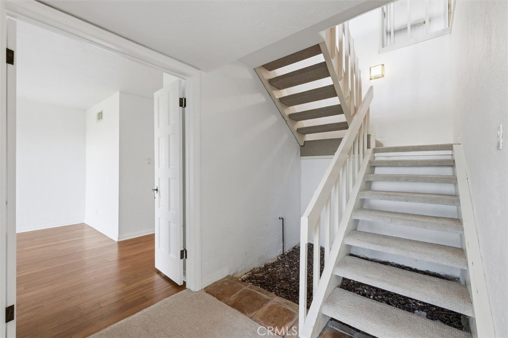 1308 Vía Coronel Palos Verdes Estates, CA 90274 - Photo 44 of 74 a view of staircase with white walls and a window