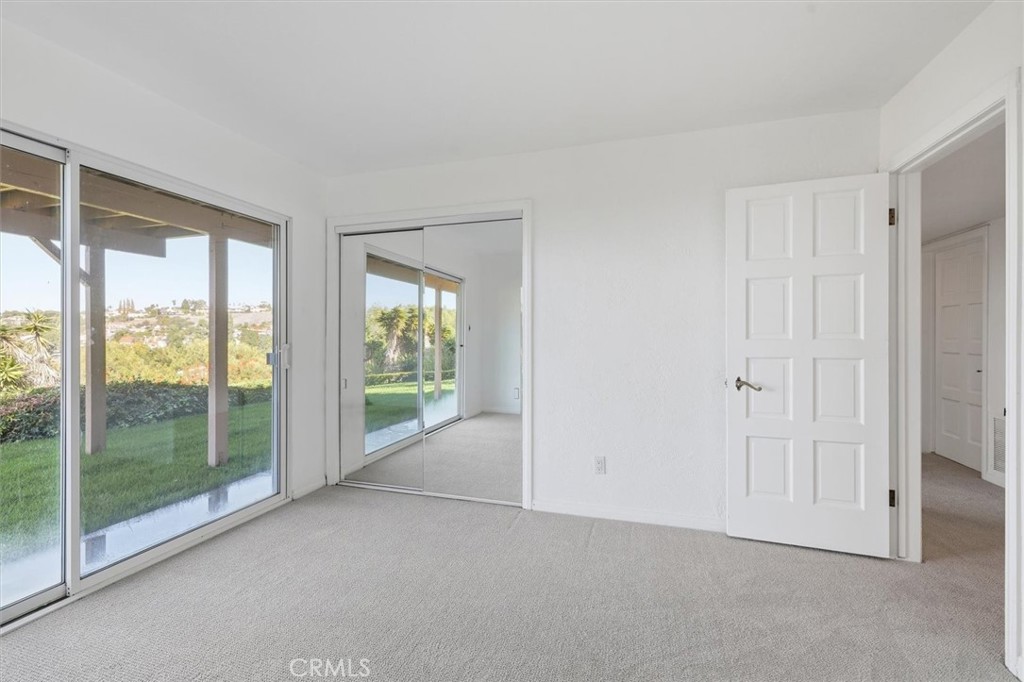 1308 Vía Coronel Palos Verdes Estates, CA 90274 - Photo 60 of 74 a view of an empty room with glass door