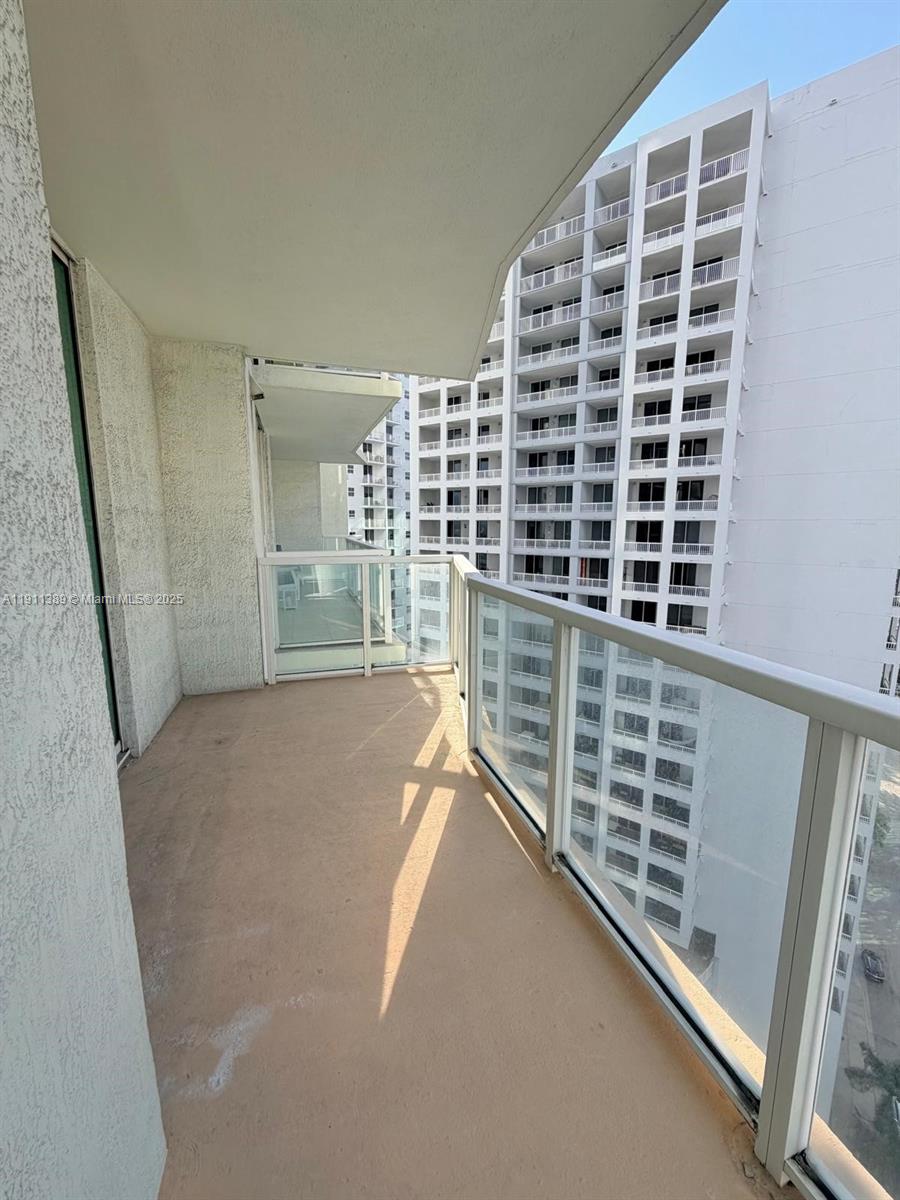 218 Southeast 14th Street, Unit 2102 Miami, FL 33131 - Photo 15 of 19 a view of balcony with window