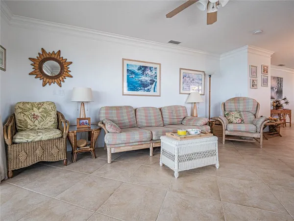 a living room with furniture and a couch