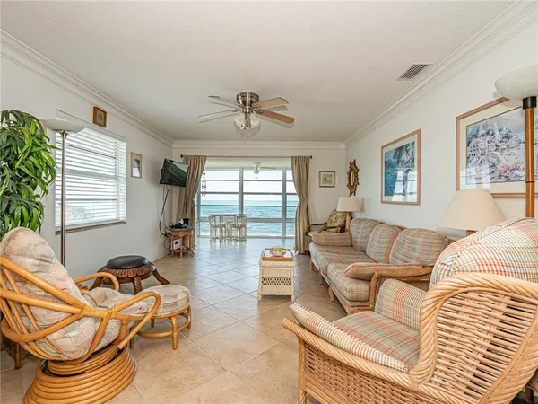 a living room with furniture or couch and a window