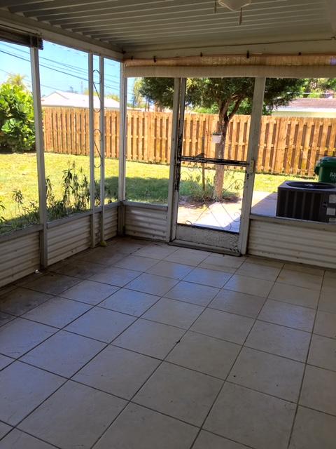 7002 Sebastian Road Fort Pierce, FL 34951 - Photo 19 of 27 Screened Porch