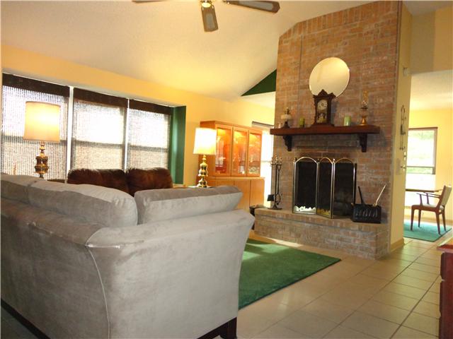 1204 Jacksons View Road Hermitage, TN 37076 - Photo 2 of 20 GREAT ROOM - talk about a GREAT room - this is it! Vaulted ceiling, wall of windows, ceiling fan, floor to ceiling wood burning fireplace with raised hearth and gas starter.