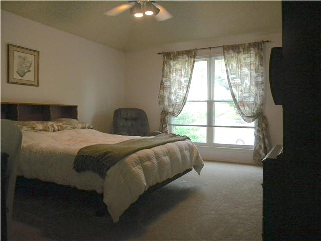 1204 Jacksons View Road Hermitage, TN 37076 - Photo 9 of 20 MASTER BEDROOM features NEW neutral carpeting, vaulted ceiling, double window, walk -in closet and large private master bath.