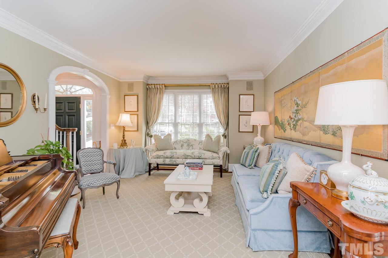 407 Forsyth Street Raleigh, NC 27609 - Photo 13 of 30 a living room with furniture and a large window