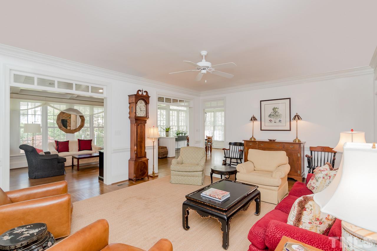407 Forsyth Street Raleigh, NC 27609 - Photo 15 of 30 a living room with furniture and a large window