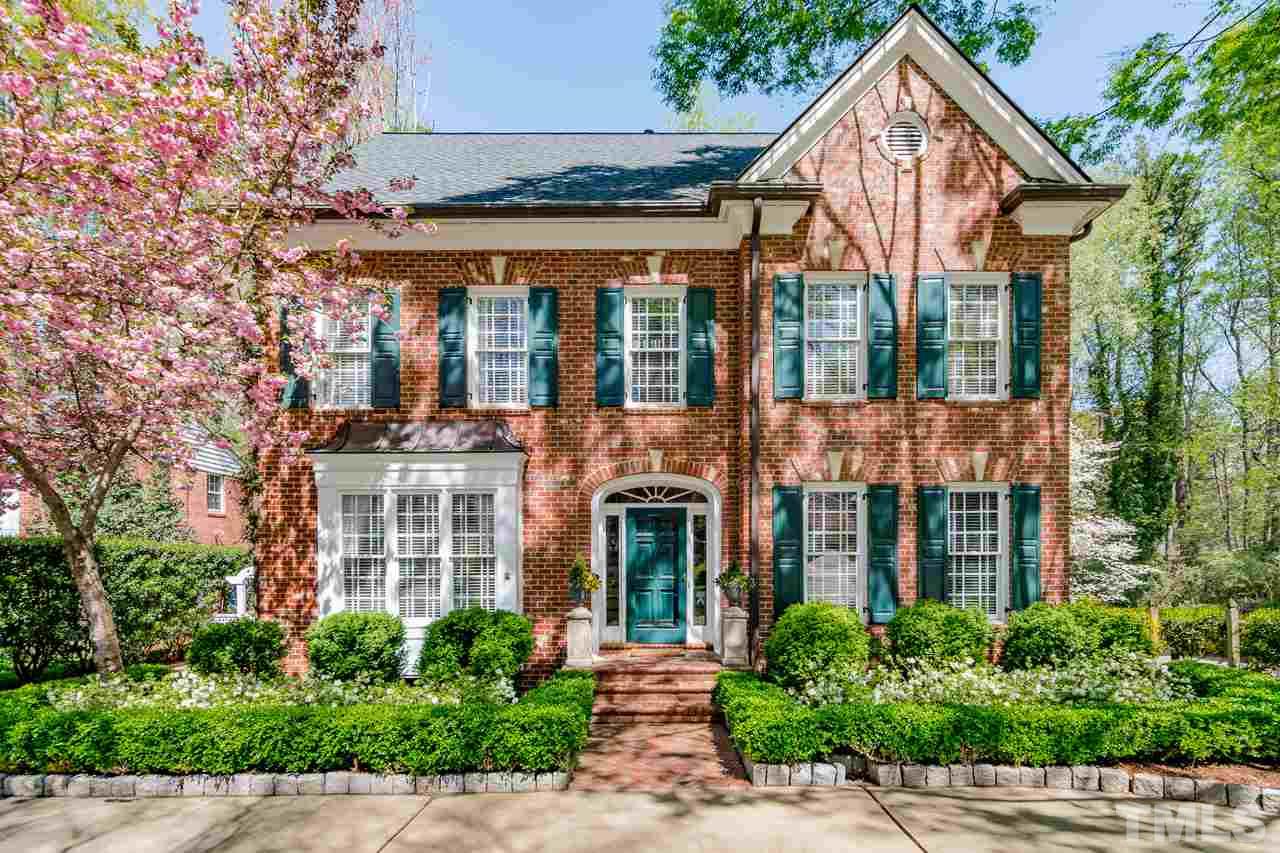 407 Forsyth Street Raleigh, NC 27609 - Photo 3 of 30 front view of a house with a yard