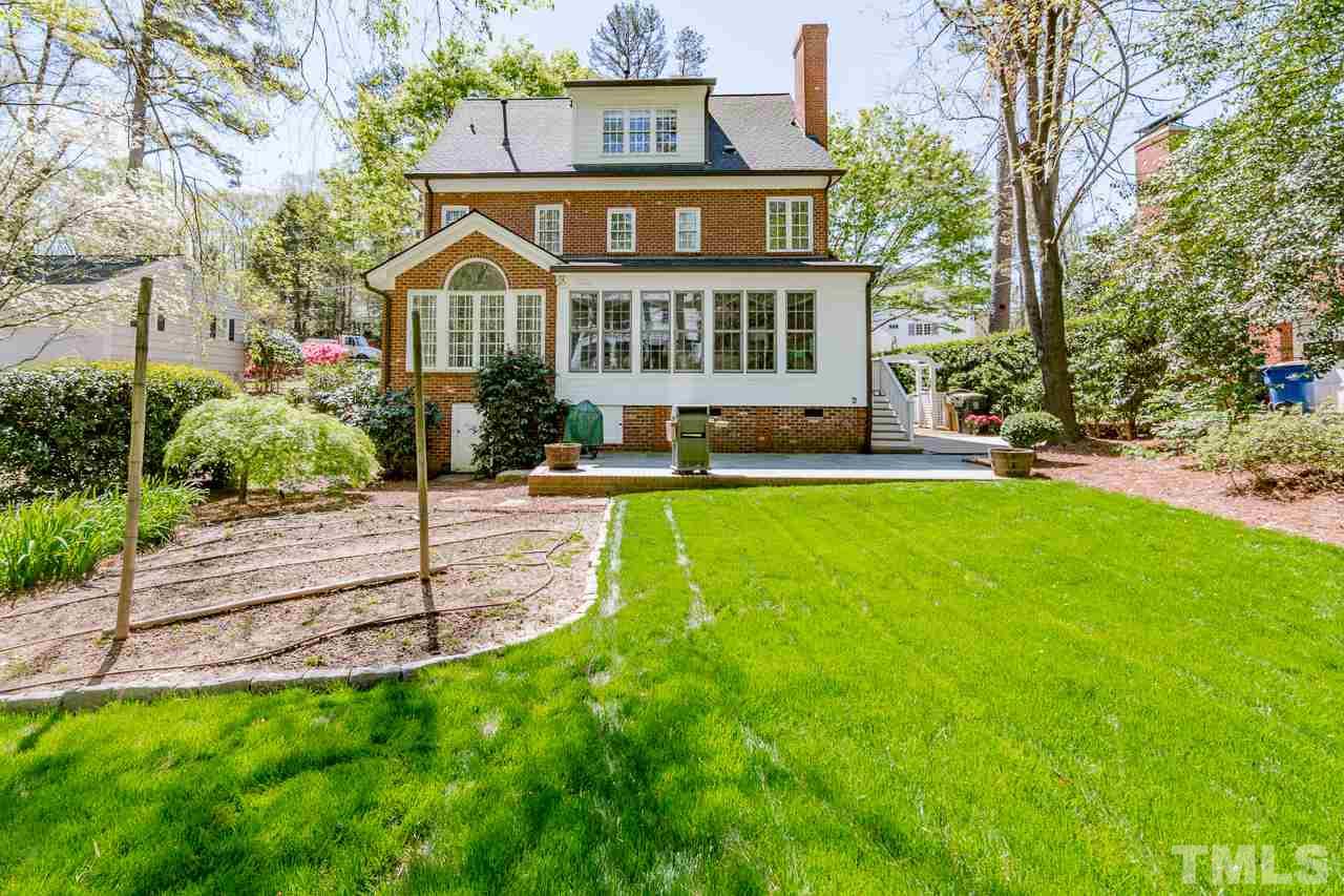 407 Forsyth Street Raleigh, NC 27609 - Photo 28 of 30 a front view of a house with a yard