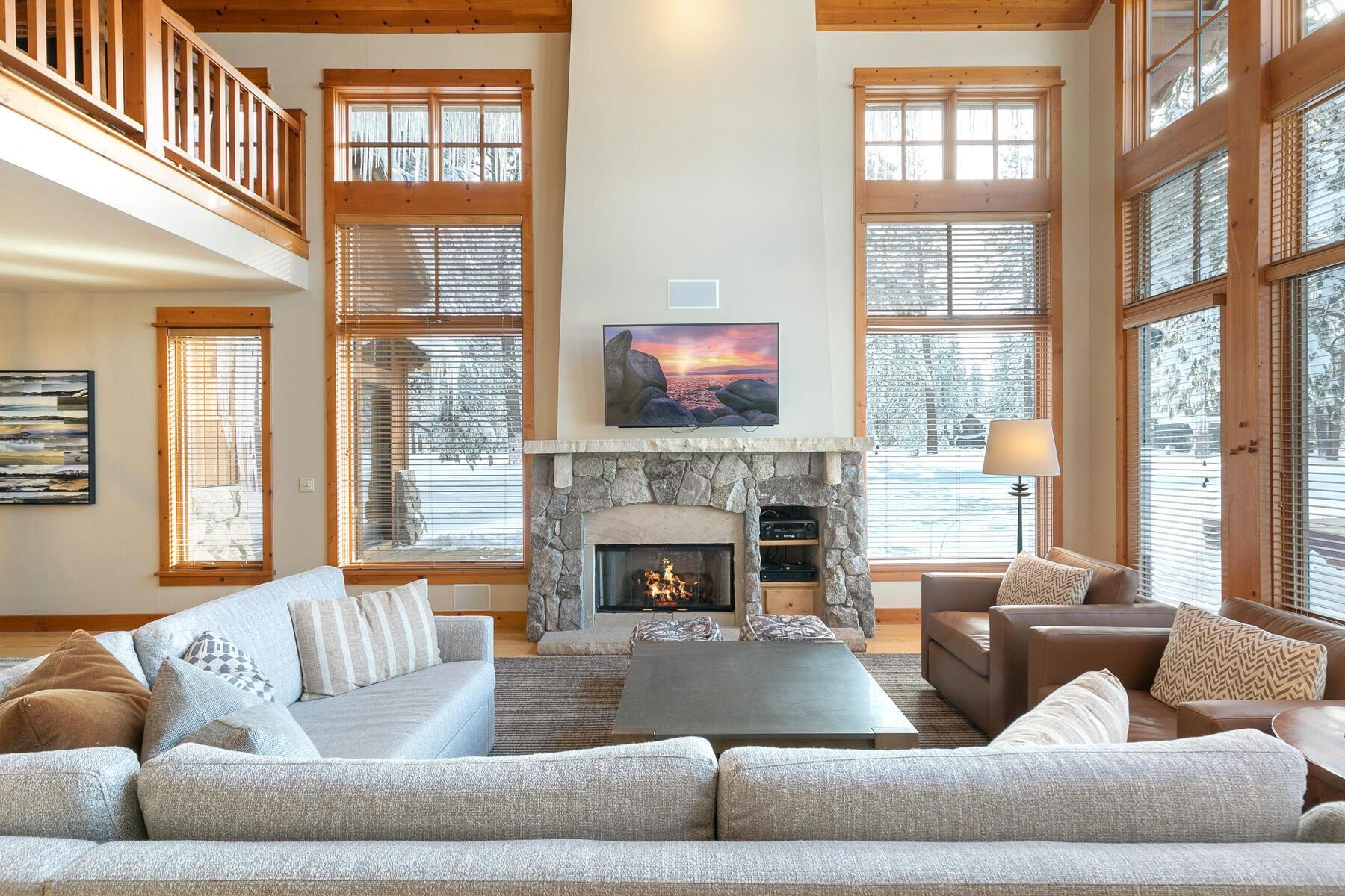 12258 Lookout Loop, Unit F2303 Truckee, CA 96161 - Photo 10 of 27 a living room with furniture window and a fireplace