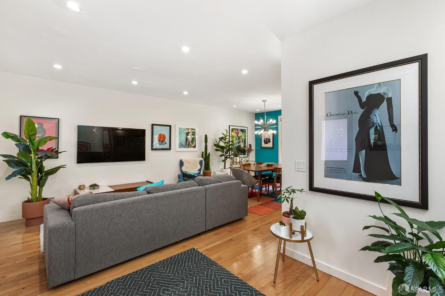328 Harriet Street San Francisco, CA 94103 - Photo 20 of 41 a living room with furniture and a flat screen tv