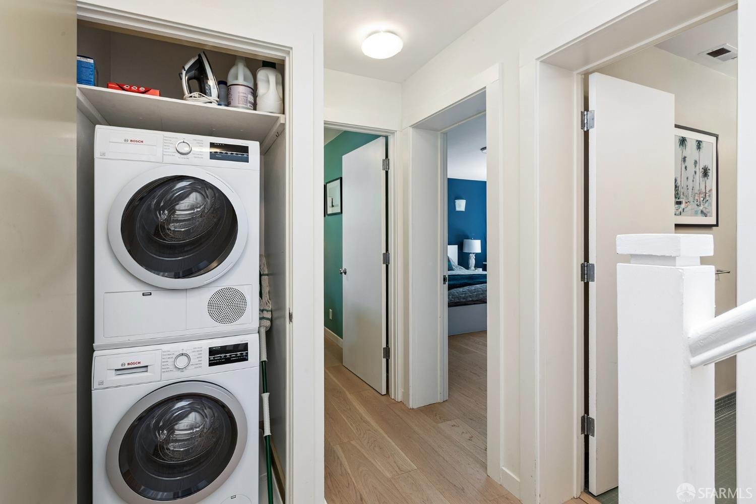 328 Harriet Street San Francisco, CA 94103 - Photo 30 of 41 a view of a hallway with washer and dryer