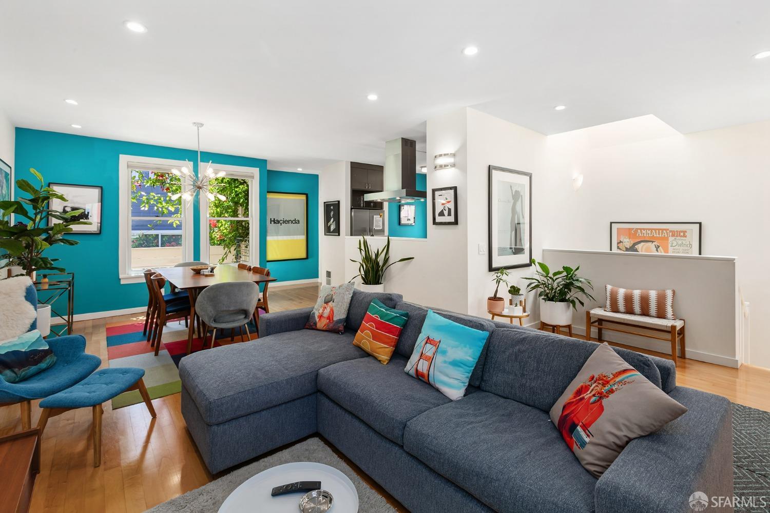 328 Harriet Street San Francisco, CA 94103 - Photo 7 of 41 a living room with furniture and a large window