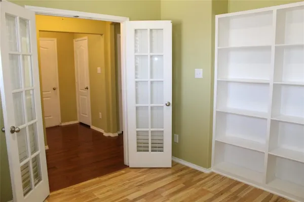 a view of an empty room and window