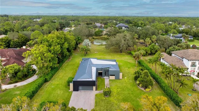 $2,800,000 | 6659 Livingston Woods Lane, Naples, FL 34109