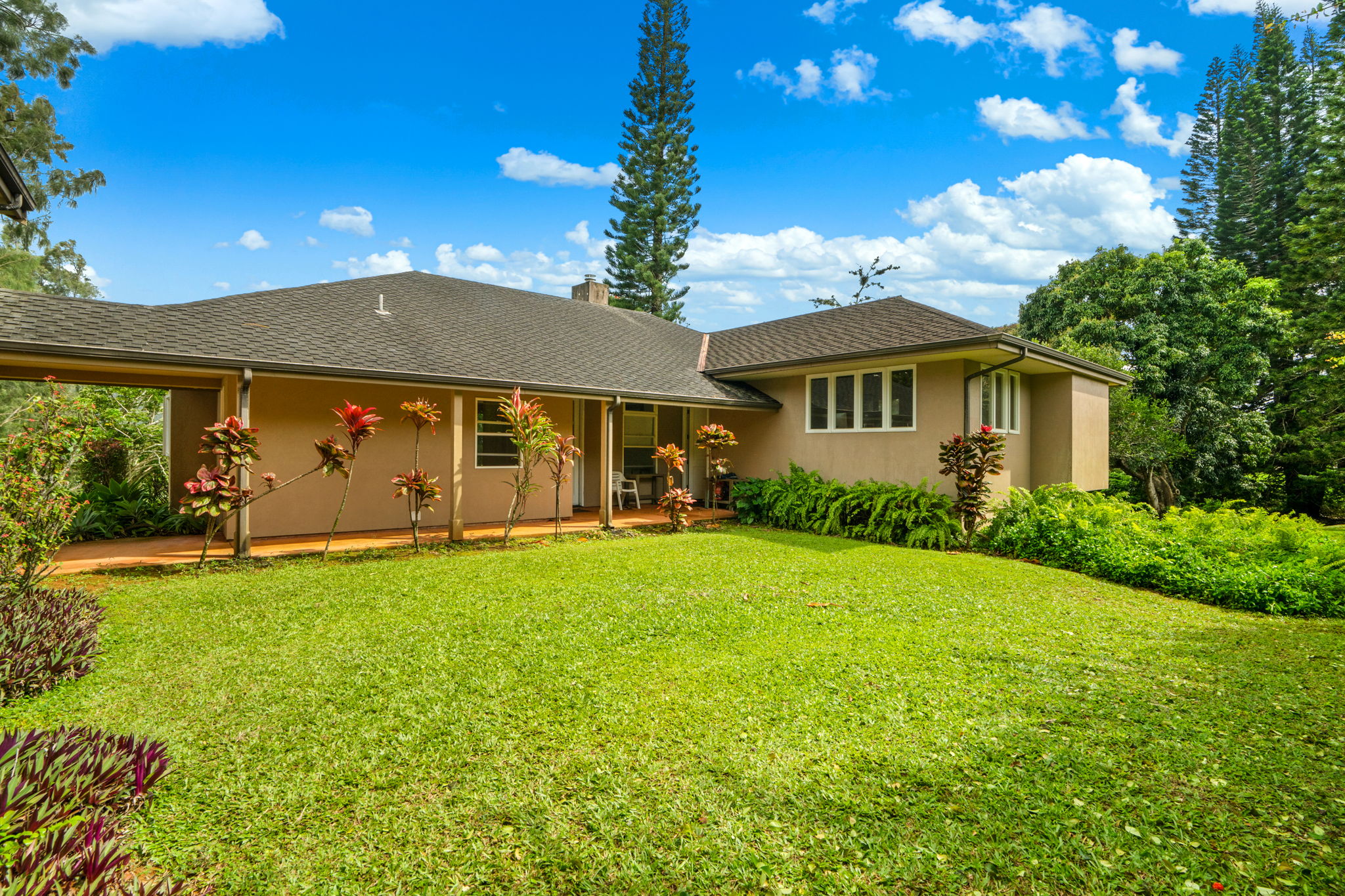 597 Puuopae Road Kapaa, HI 96746 - Photo 5 of 30 a view of a house with backyard and garden