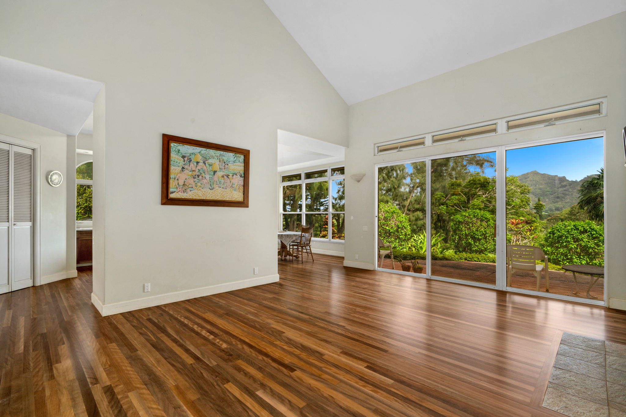 597 Puuopae Road Kapaa, HI 96746 - Photo 8 of 30 a view of an empty room with wooden floor and a window