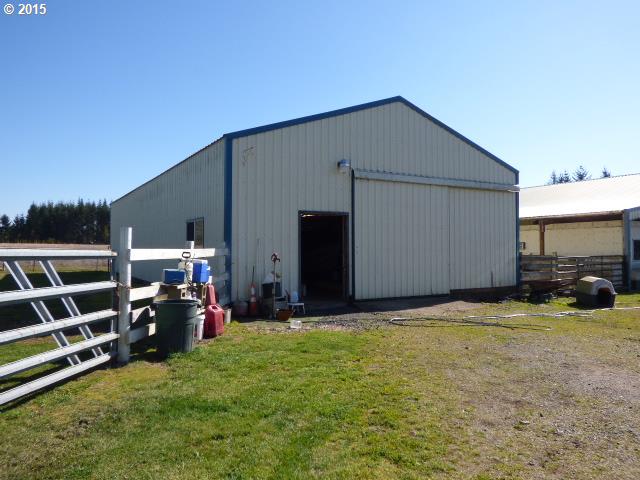 18639 South Springwater Road Estacada, OR 97023 - Photo 4 of 16 a view of a house with a yard and garage