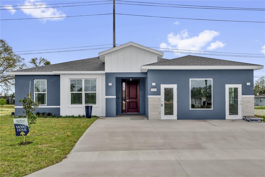 2008 River Hawk Loop Winter Haven, FL 33880 - Photo 2 of 37 a view of a house with sitting area and garden