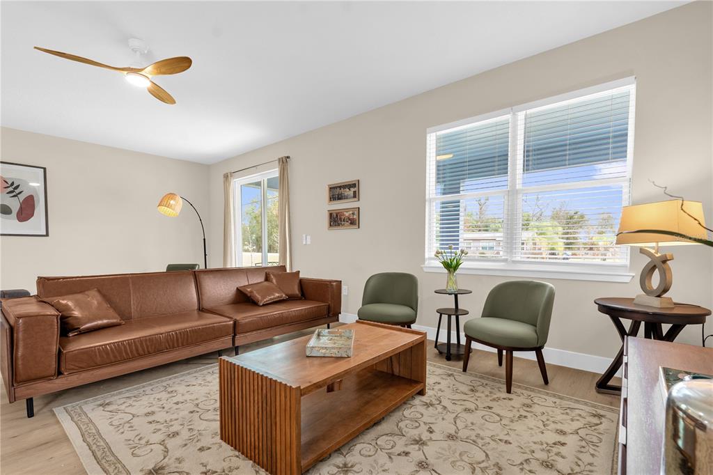 2008 River Hawk Loop Winter Haven, FL 33880 - Photo 5 of 37 a living room with furniture and a window