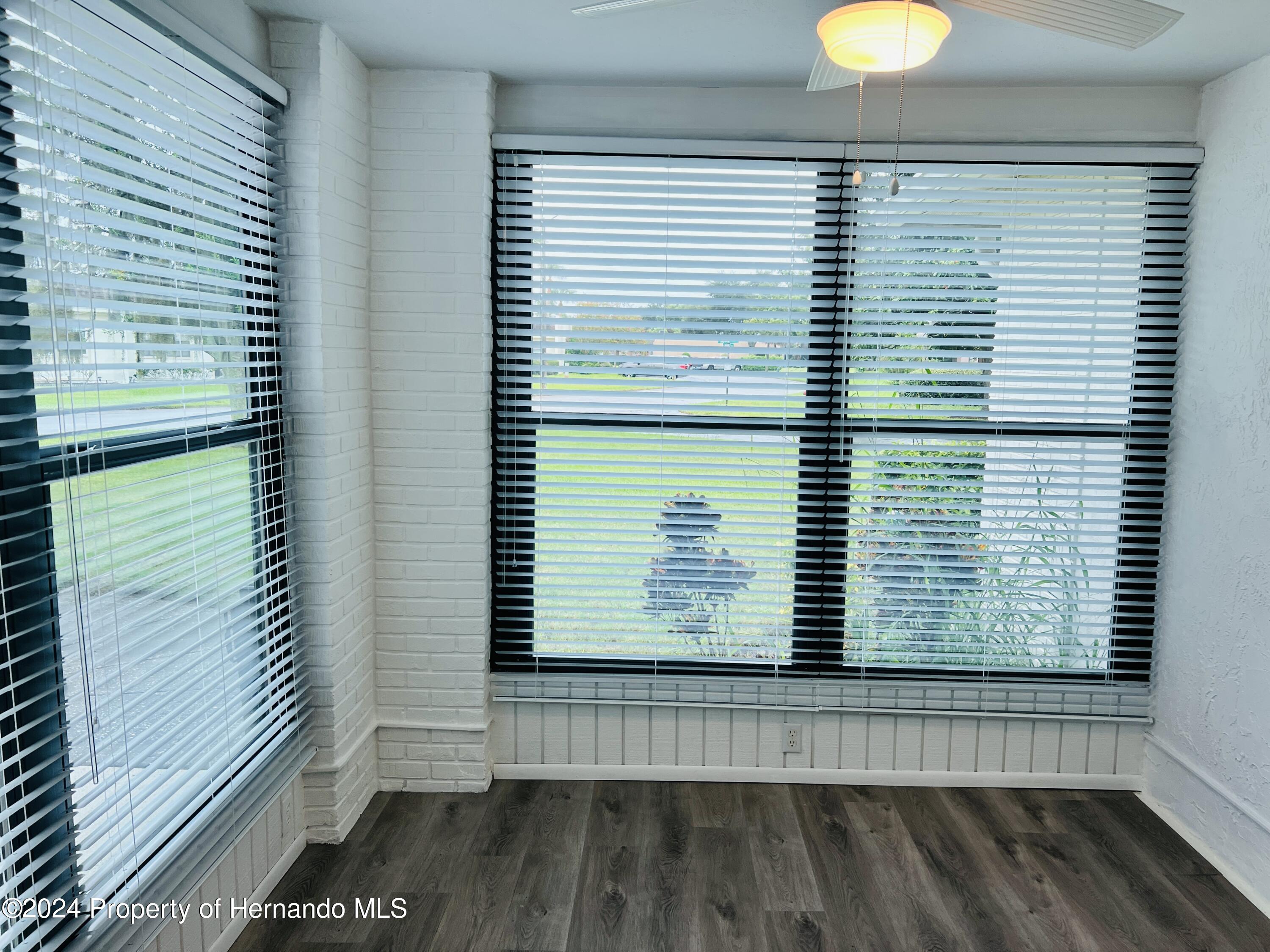8141 Bugle Court Port Richey, FL 34668 - Photo 8 of 25 a view of a balcony with window