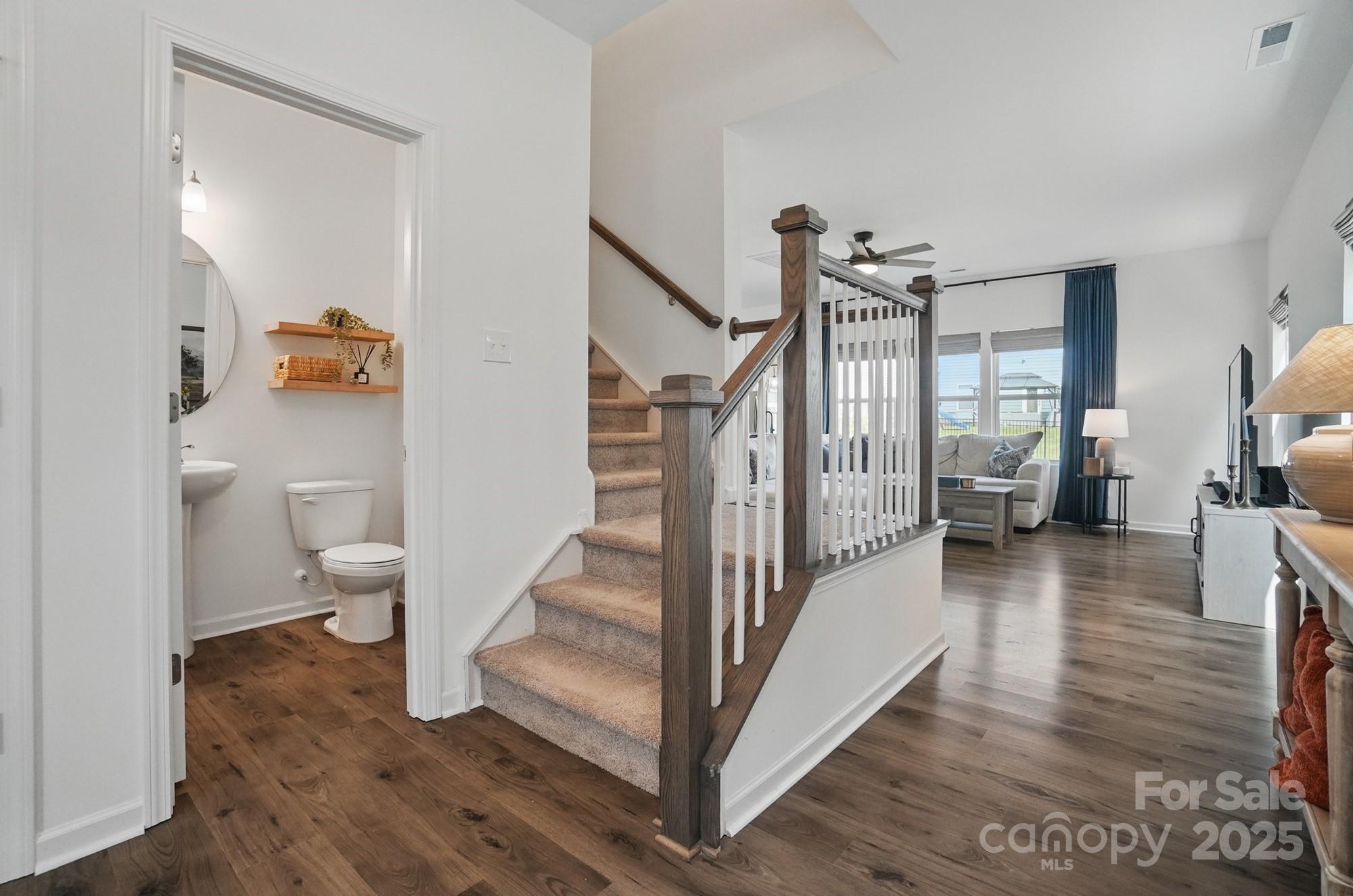 637 Scotch Meadows Loop Monroe, NC 28110 - Photo 13 of 30 a view of entryway and hall with wooden floor