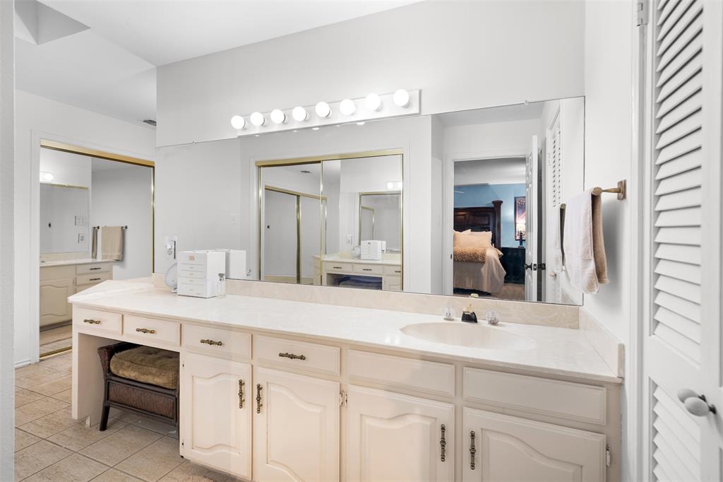 404 Laurel Trail North Terrell, TX 75160 - Photo 14 of 39 a bathroom with a sink vanity and mirror