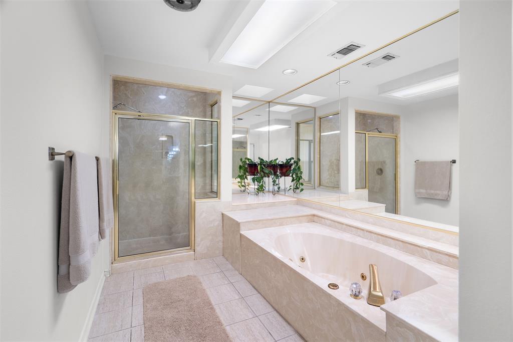 404 Laurel Trail North Terrell, TX 75160 - Photo 15 of 39 a bathroom with a bathtub shower and a sink