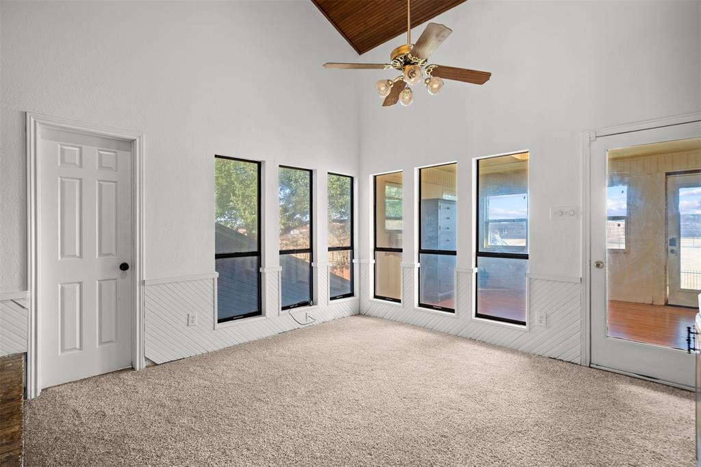 404 Laurel Trail North Terrell, TX 75160 - Photo 26 of 39 an empty room with fan and windows