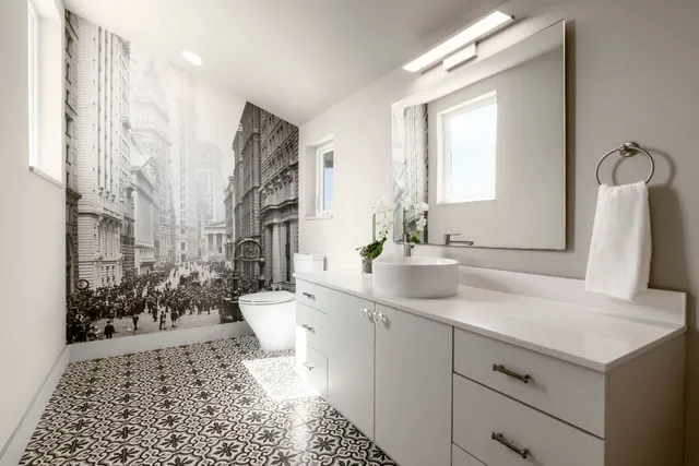 a living room with furniture wooden floor and a large window