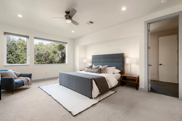 a bed room with a bed and a couch