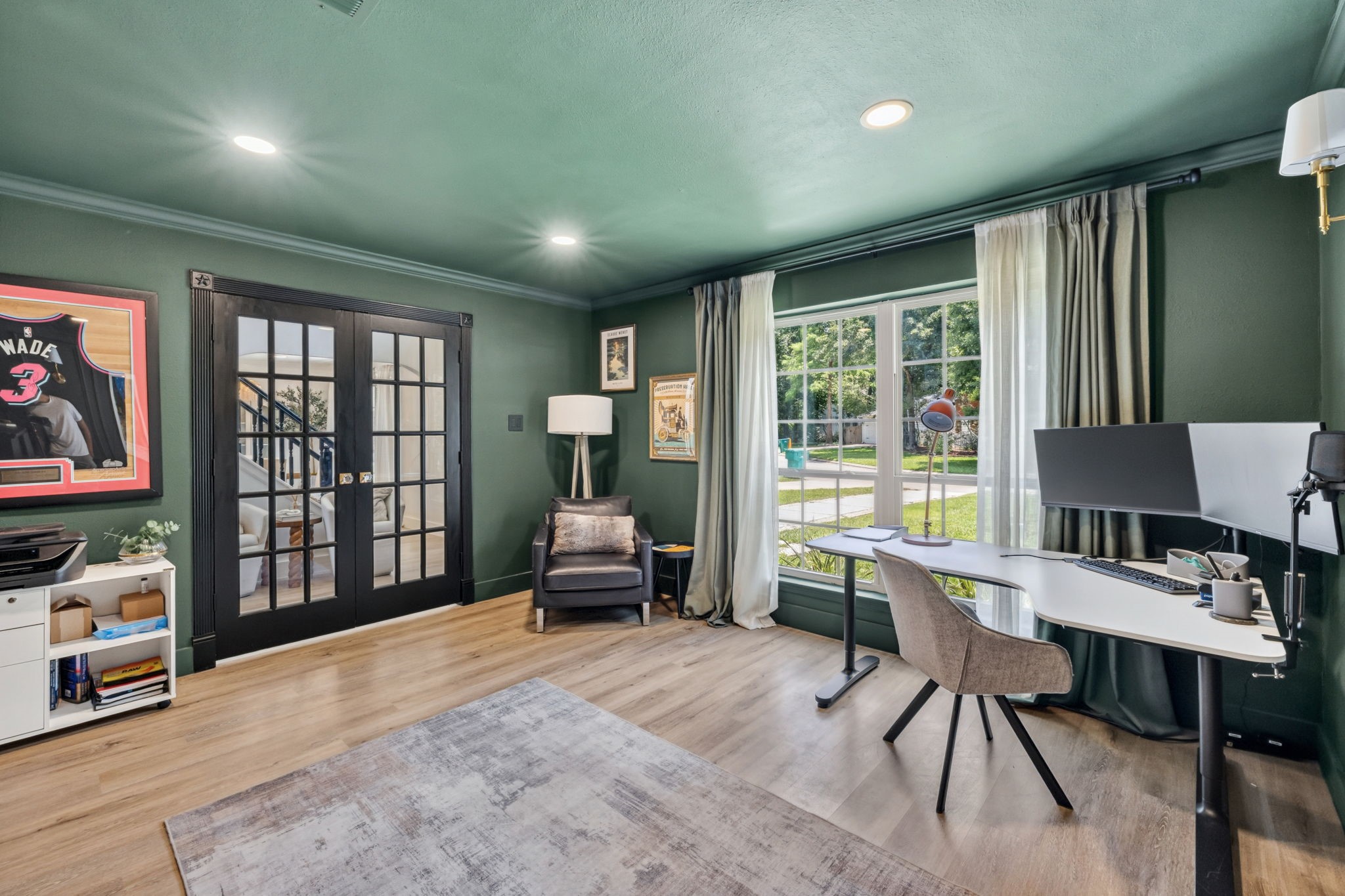129 North Rainbow Ridge Circle Spring, TX 77381 - Photo 9 of 47 Striking black doors add contrast and character to the space