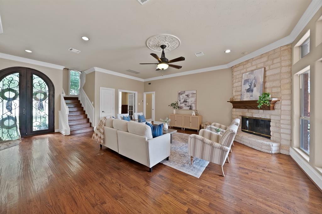 1110 McCampbell Road Mansfield, TX 76063 - Photo 2 of 39 a living room with furniture and wooden floor