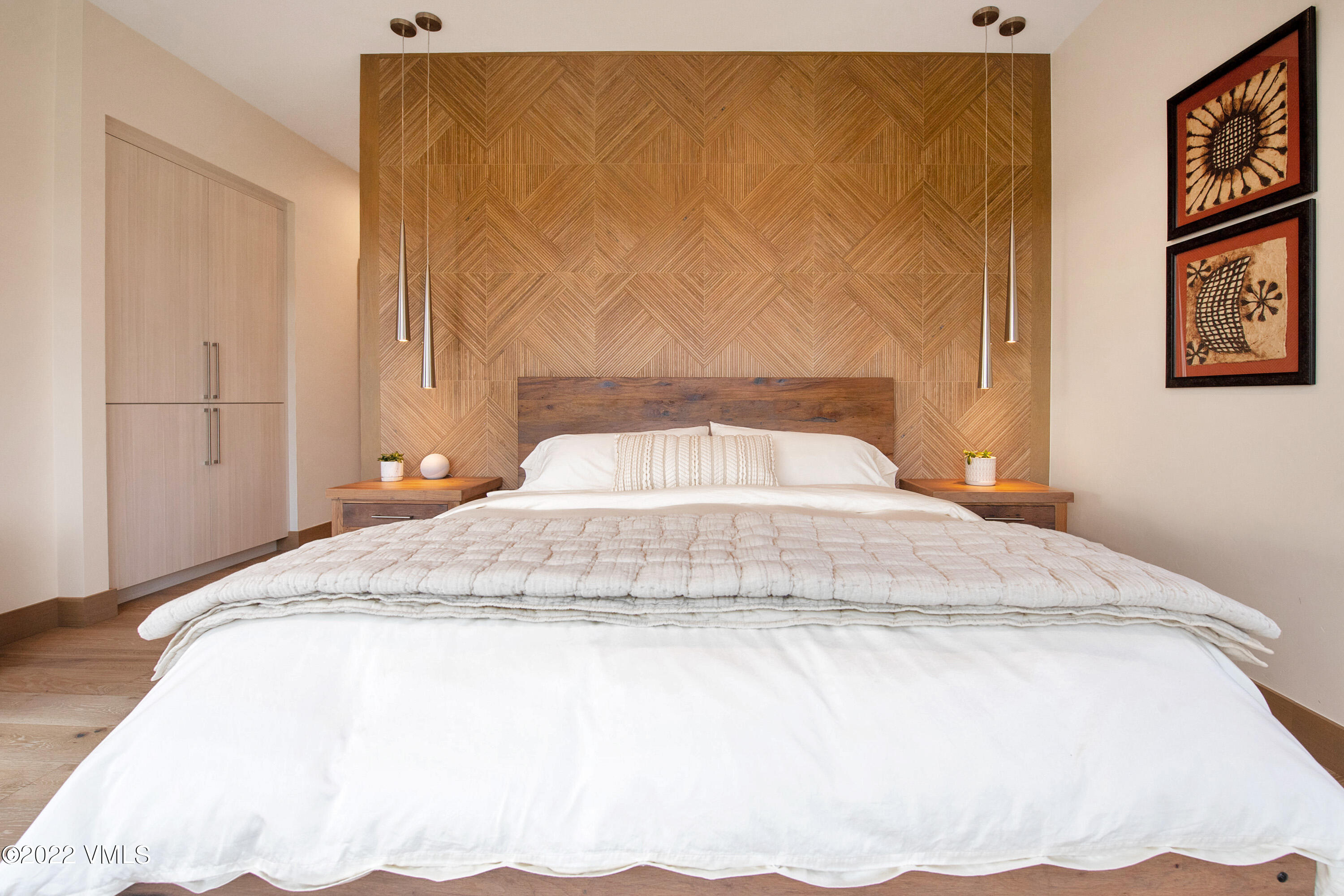 2185 East Haystacker Drive Eagle, CO 81631 - Photo 11 of 30 a bedroom with a bed and a wall painting