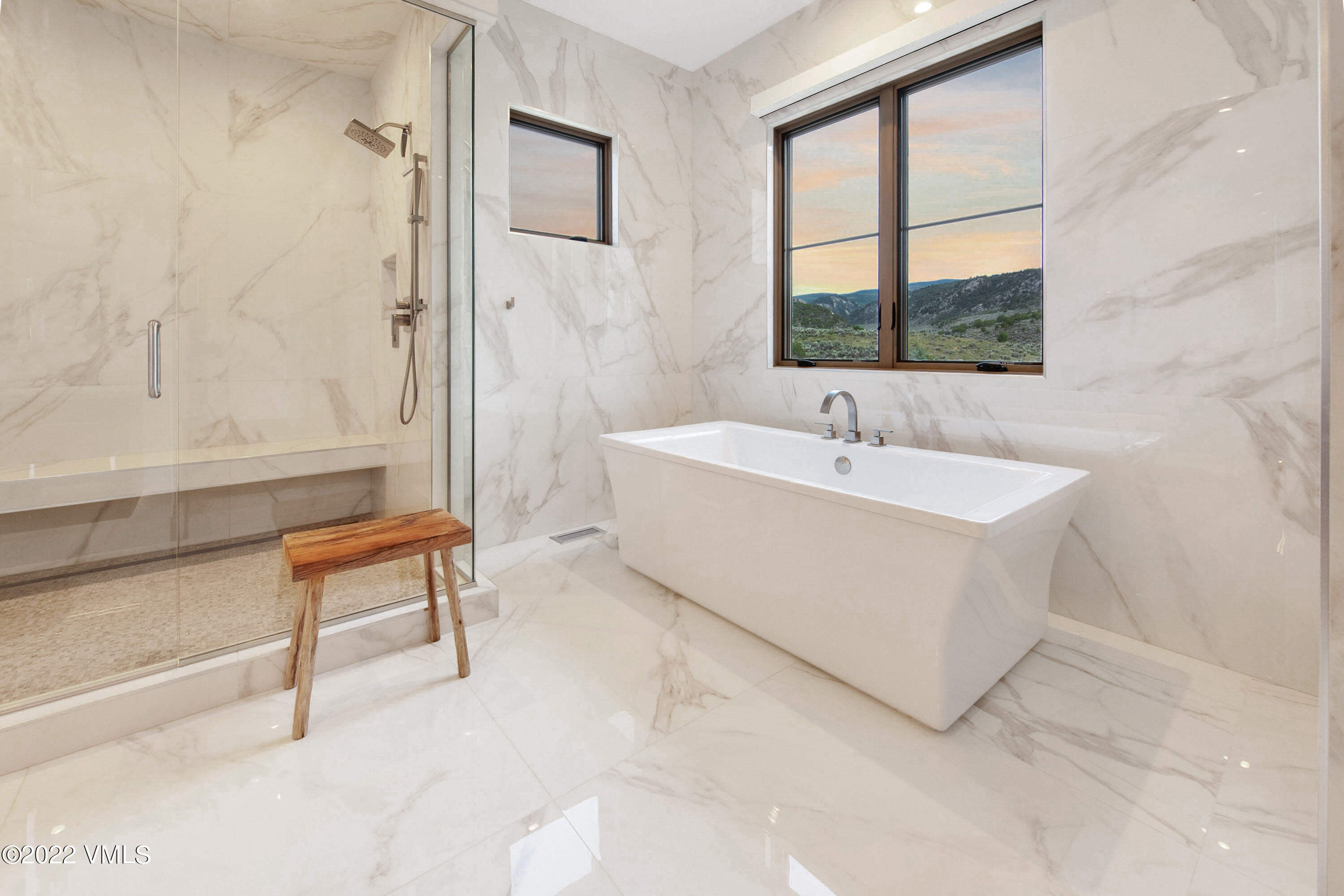 2185 East Haystacker Drive Eagle, CO 81631 - Photo 14 of 30 a white bath tub sitting next to a window