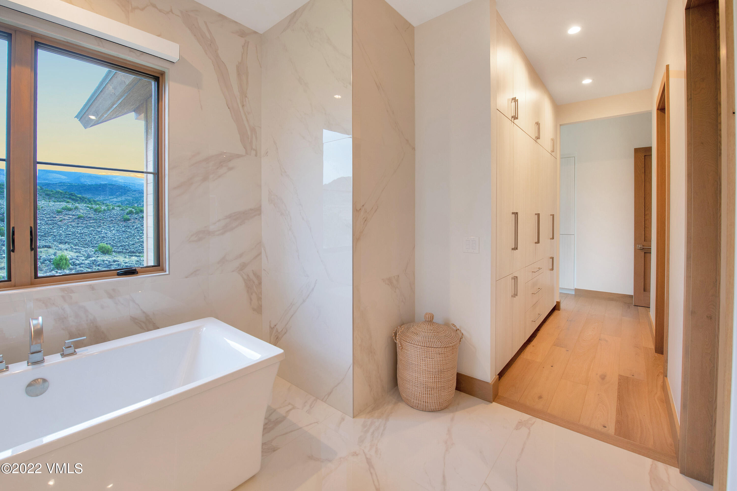 2185 East Haystacker Drive Eagle, CO 81631 - Photo 16 of 30 a bathroom with a bathtub and shower