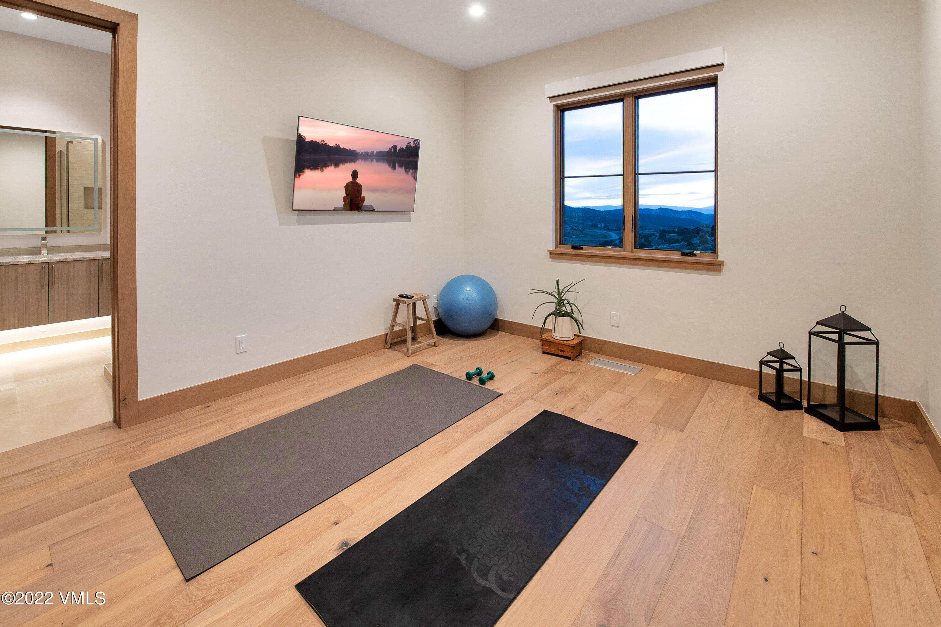 2185 East Haystacker Drive Eagle, CO 81631 - Photo 23 of 30 a room with a bed and a window